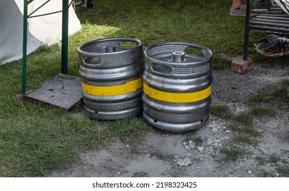 Beer Keg Or Cask, Aluminium Barrels To Transport And Store Beer. Metal Containers Used At Outdoor Open Air Party Event.