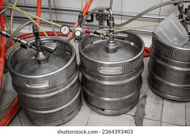 beer kegs connected to tap system - Powered by Shutterstock