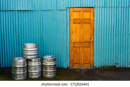 Beer Kegs Outside The Back Of Old Rural Irish Pub