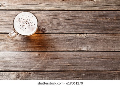 Beer Mug On Wooden Table. Top View With Copy Space