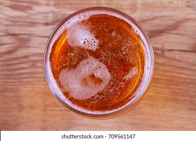 Beer On Wooden Background. Glass Of Beer Or Ale, View From Above, Top Studio Shot, Overhead