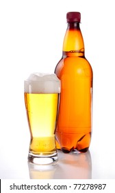 Beer In Plastic Bottle And Glass On A White Background