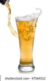 Beer Pouring From Bottle Into Glass Isolated On White