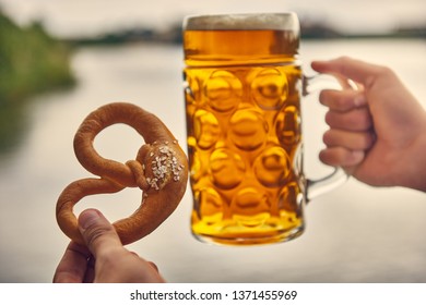 Beer And Pretzel In Hand, Holding Pretzel And Beer