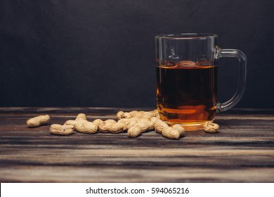 beer with roasted peanuts in shell