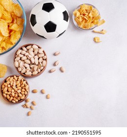 Beer And Snack On Gray Table With Football Ball, Football Game Night Food, Copy Space