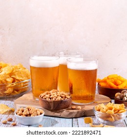 Beer And Snack On Wooden Table, Football Game Night Food Or Man Party Night Concept