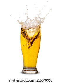 Beer Splash In Glass Isolated On White Clipping Path