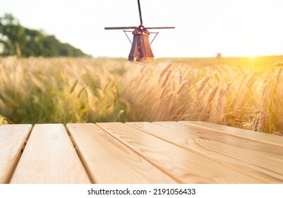 Beer. Still life with Vintage beer barrel and glass light beer. Fresh amber beer concept. Green hop and gold barley on wooden table. Ingredients for brewery. Brewing traditions - Shutterstock ID 2191056433