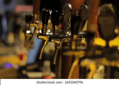 Beer taps in the bar - Shutterstock ID 1655343796