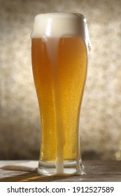 Beer.Pint Of Beer Close Up Isolated On Abstract Background. Cold Craft Light Beer In A Glass