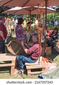 Beervelde, Belgium, 08 May 2022, Basket Weaver Gives A Demonstration On An Open Garden Day