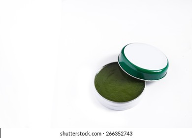 Beeswax Balm In Tin Potsblister On White Background , Green Balm On White Background