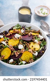 Beet And Goat Cheese Salad With Orange Dressing And Yellow And Red Beets