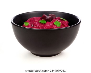 Beet Hummus Dip In A Black Bowl Isolated On A White Background