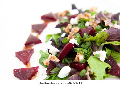 Beet Salad With Goat Cheese, Candied Walnuts, Spring Greens, And Herbs