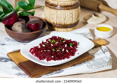 Beet salad with sunflower oil, parsley and sunflower seeds.