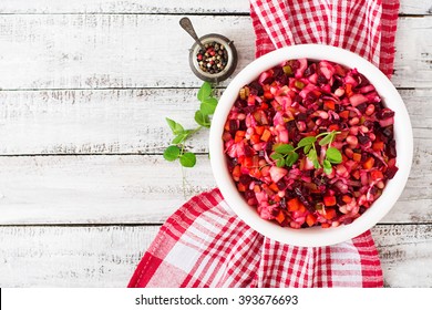 Beet Salad Vinaigrette In A White Bowl. Top View