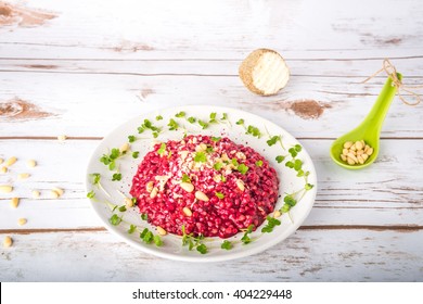 Beetroot and buckwheat risotto with cress, Belper Knolle cheese and pine nuts