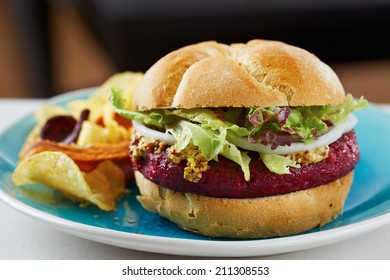 Beetroot Burger On White Bread With Chips