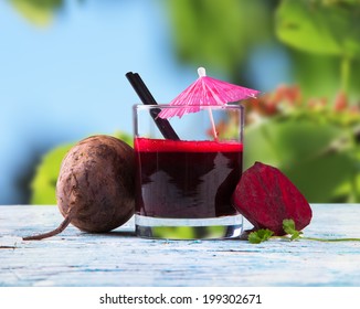 Beetroot Juice,Healthy Drink On Wood With Nature Background.