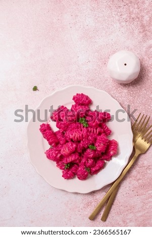 Beetroot Pasta, Barbie Themed Pasta. Pink noodles on pink background.