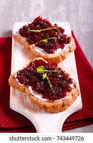 Beetroot Relish Over Brown Bread On Board