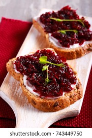 Beetroot Relish Over Brown Bread On Board