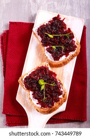 Beetroot Relish Over Brown Bread On Board