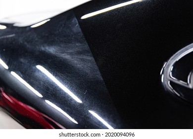 Before and after effect after car varnish renovation and paint correction - Shutterstock ID 2020094096