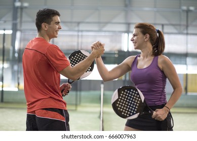 Before Or After Macth, Couple Hi Five In Paddle Tennis Court