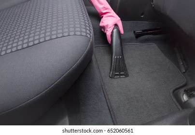 Before Chemical Cleaning Process A Professionally Nozzle Releasing Car Floor From Dust And Sand. Early Spring Cleaning Or Regular Clean Up. 