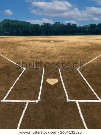 Before the game, a beautifully maintained baseball field.