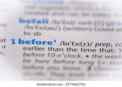 Before word in a dictionary. Selective focus, close up.
