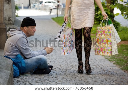 https://image.shutterstock.com/image-photo/beggar-rich-young-woman-shopping-450w-78856468.jpg