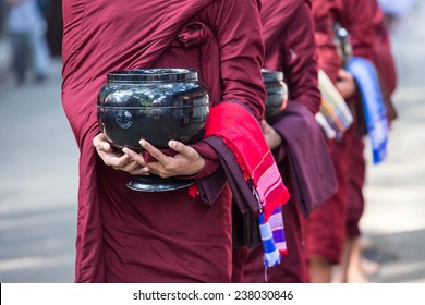 Begging Bowl In Hand Of Monk