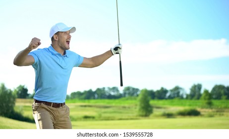Beginner Golf Player With Club In Hand Rejoicing Successful Shot, Luck And Sport