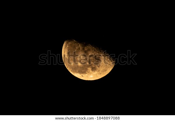 The beginning of\
the Lunar Moon Eclipse. This can occur only when the sun, Earth and\
moon are aligned exactly and may be viewed from anywhere on the\
night side of the Earth.