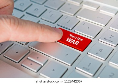 beginning of the third world war. Start war inscriptions on the grey silver keyboard button close up. , Red button. - Shutterstock ID 1122442367