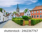 Beguinage Courtrai, Begijnhof van Kortrijk with white houses and Sint-Annazaal museum, cobblestone street in Kortrijk city historical centre, Saint Martin