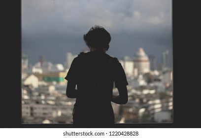 Behide man shadow window