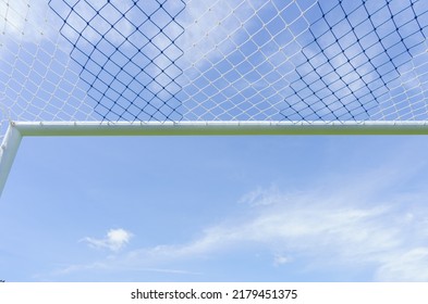 Behind The Ropes Of The Outdoor Soccer Field Goal Net, The Football Goal Background