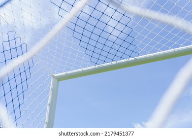 Behind The Ropes Of The Outdoor Soccer Field Goal Net, The Football Goal Background