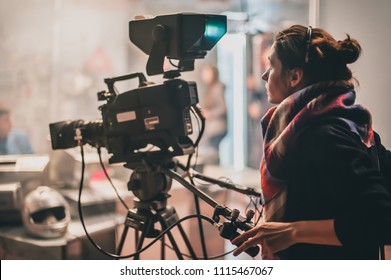 Behind the scene. Actor in front of the camera on the film set in film studio.  - Shutterstock ID 1115467067