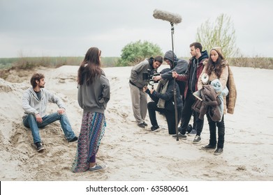 Behind The Scene. Film Crew Team Filming Movie Scene On Outdoor Location. Group Cinema Set