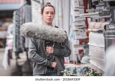 Behind The Scene. Sound Boom Operator Resting On The Set And Hold Microphone Fisher Outdoor