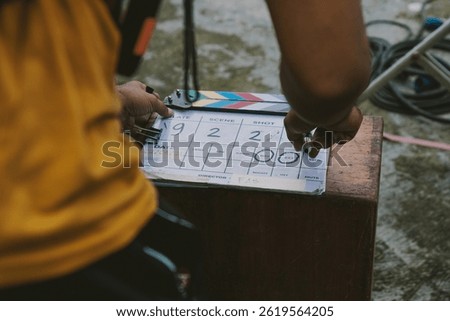 Behind the scenes with a clapper board