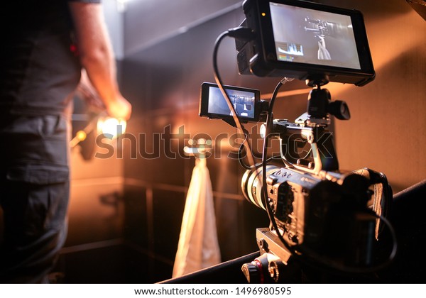 Behind the scenes of filming films or video\
products and the film crew of the film crew on the set in the\
pavilion of the film\
studio.