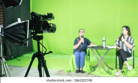 Behind The Scenes Of A Livestream At A Studio With Greenscreen And A Digital Camcorder. Behind The Scenes Of TV Movie Video Film. A Lifestyle Or Ministry Show.