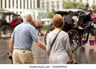 A Behind Shot Of An Elderly Couple On A Romantic Walk In New York City